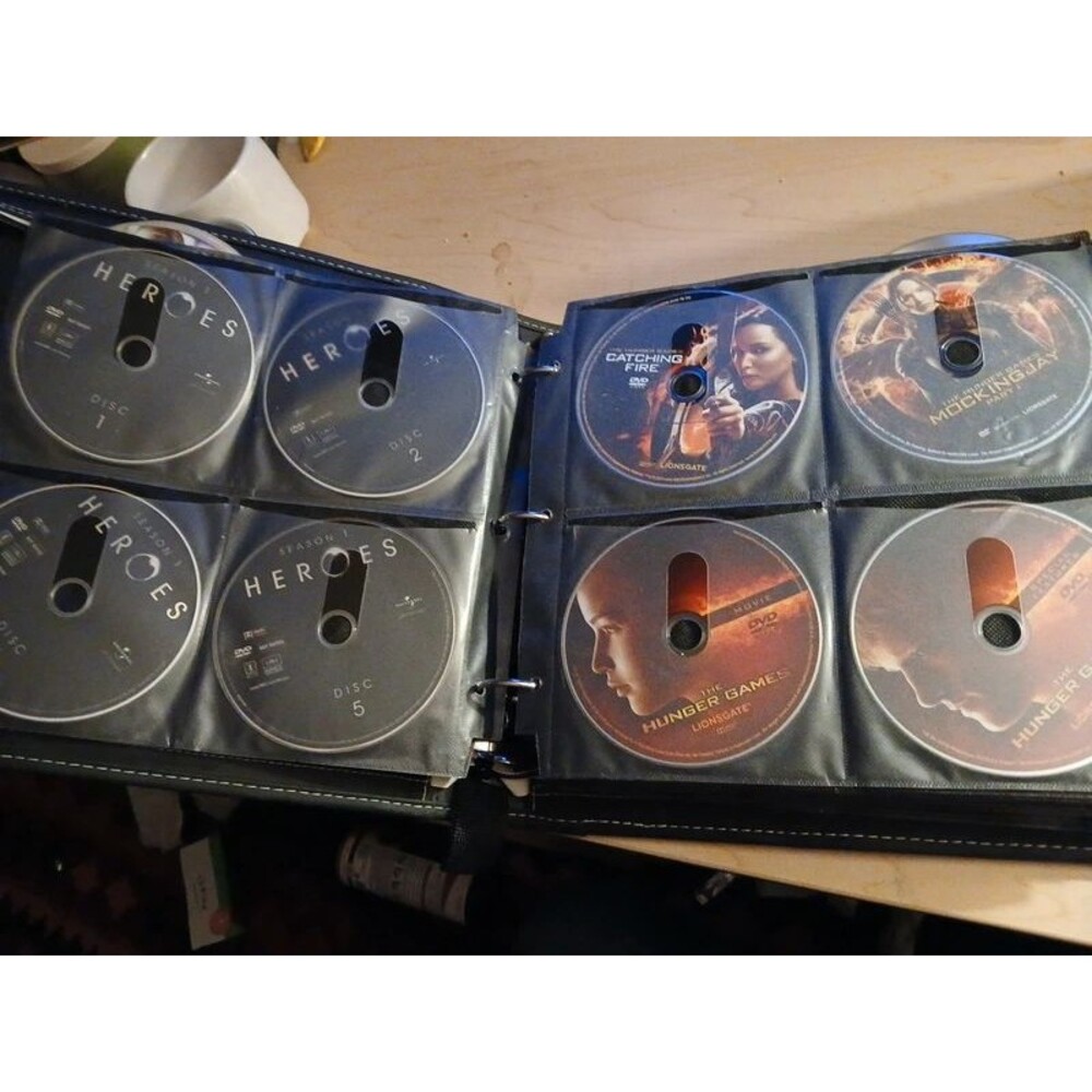 Binder with 125 movies Heroes Fargo Hobbit Harry Potter LOR